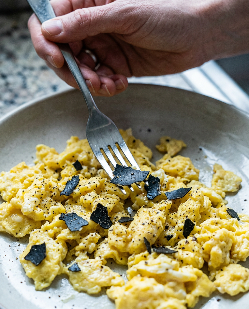 Scratched flaking non-stick pan with coating in the food
